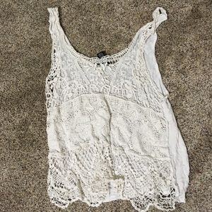 White crochet design tank and blue patterned tank